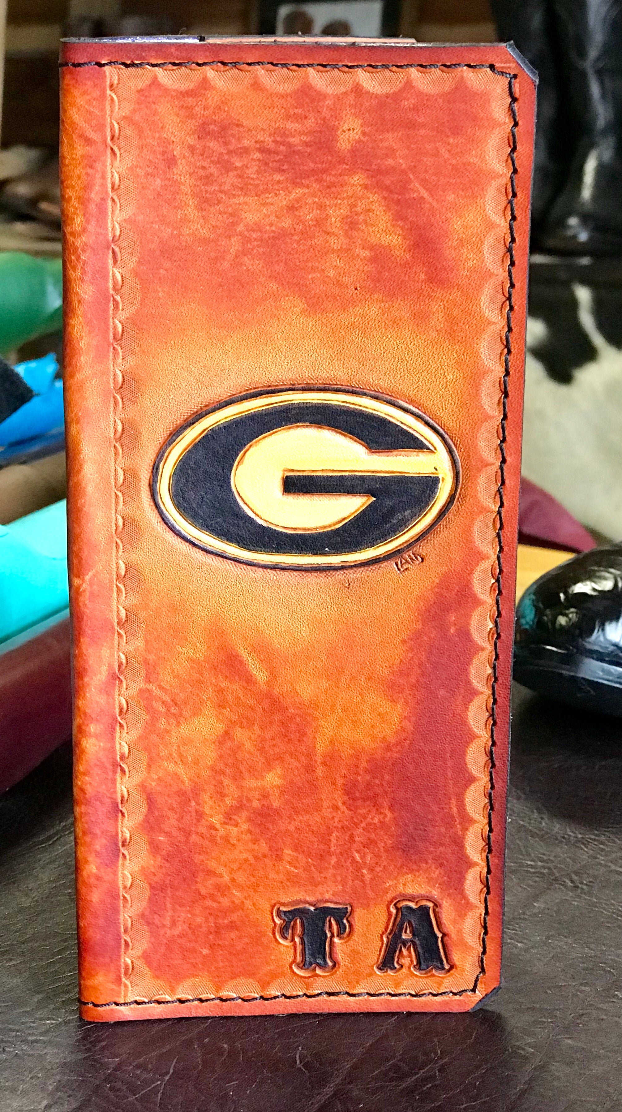 Handmade Custom Leather Items - All Handmade in Texas. Boot Jack, Tally Book, Pistol Case, Holster